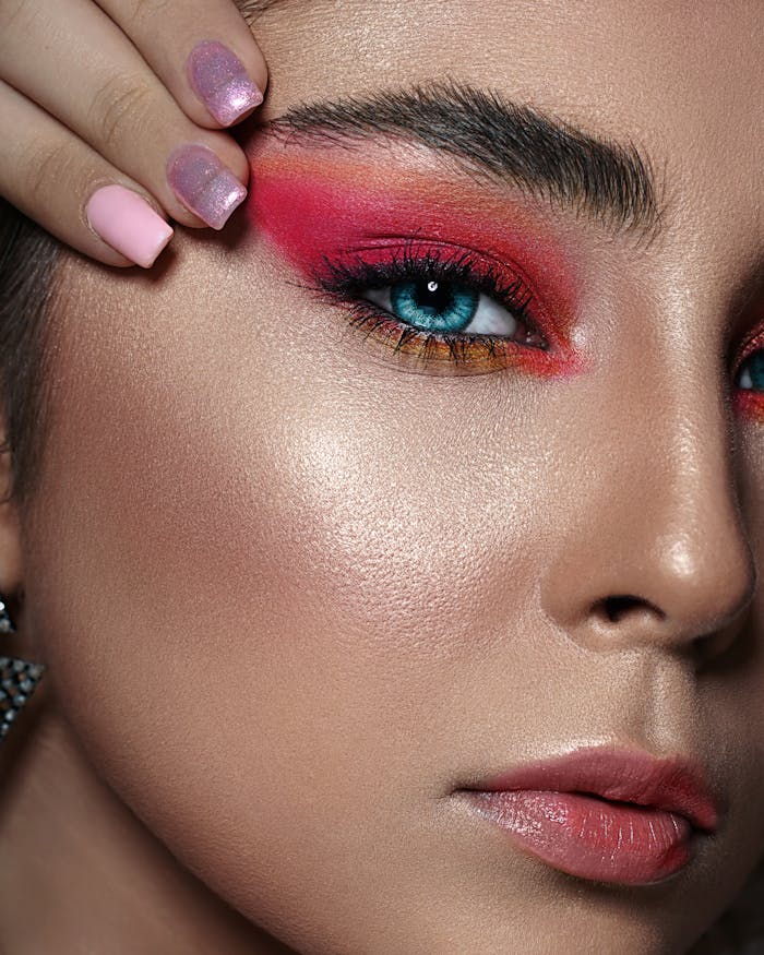 glowy flasles skin makeup with red eye shadow makeup