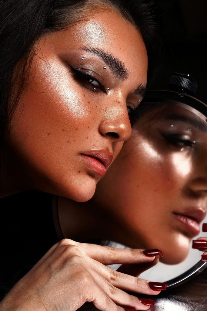 perfect bronze skin makeup with contouring and highlighting. and hair