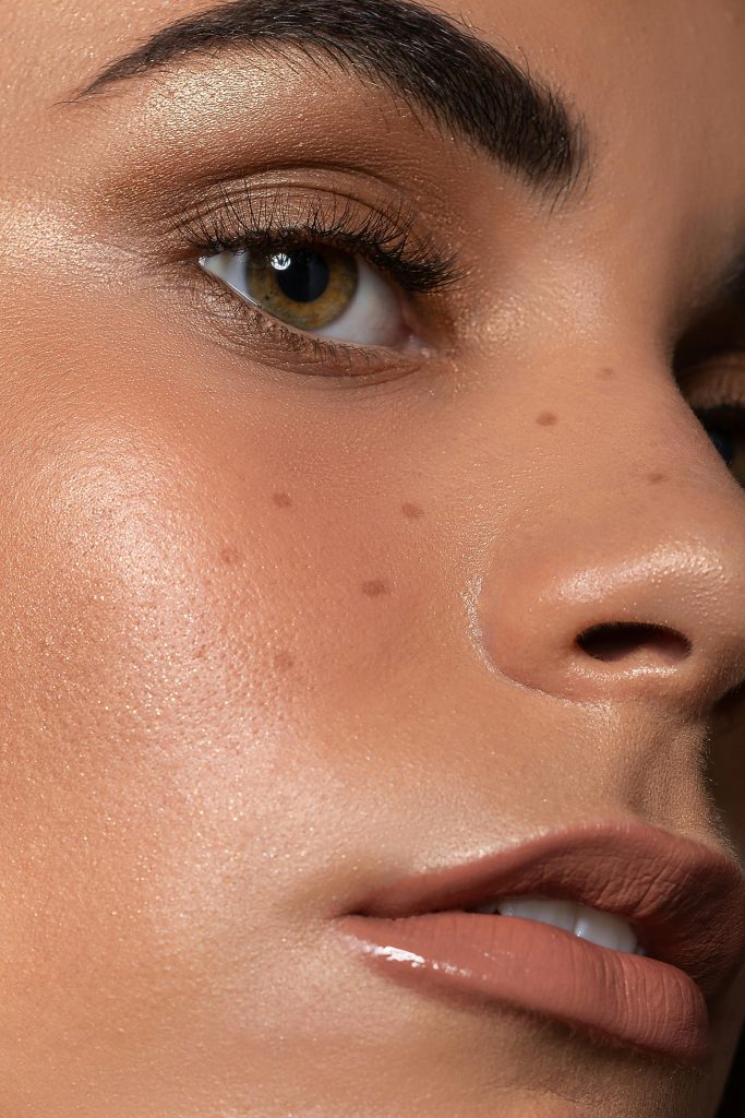 perfect skin makeup with contouring and highlighting, nude lips bronze eye makeup for beauty makeup magazine