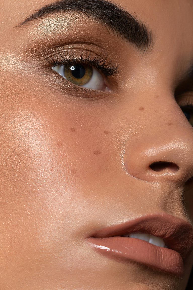 perfect skin makeup with contouring and highlighting, nude lips bronze eye makeup for beauty makeup magazine