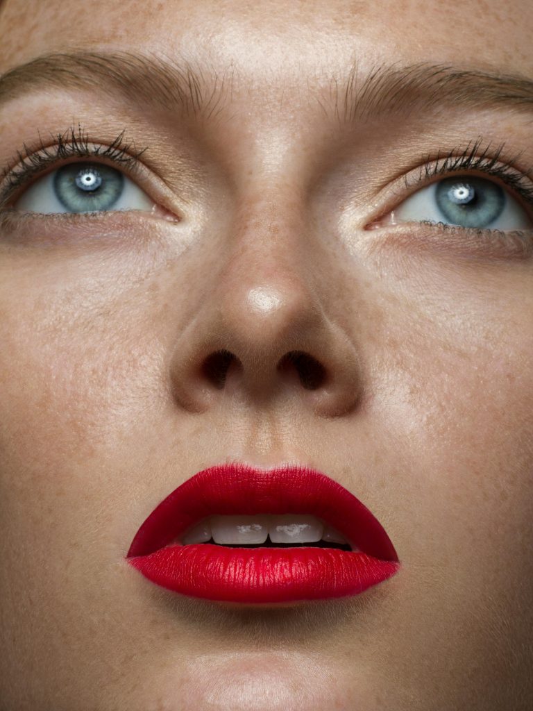 perfect skin makeup with contouring and highlighting, red lips and blush makeup for beauty makeup magazine