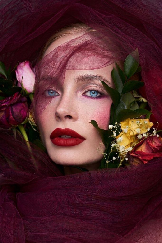 beauty editorial for vogue beauty, Red lips and pink blush with flowers and roses